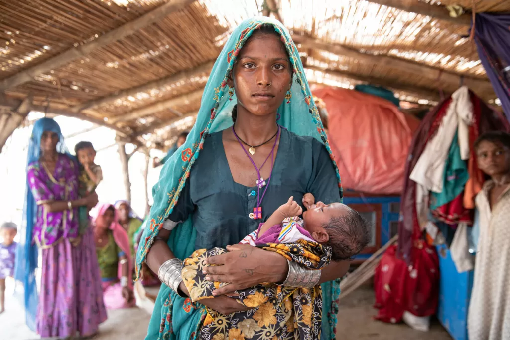Salma 22, and her baby receiving treatment in Pakistan