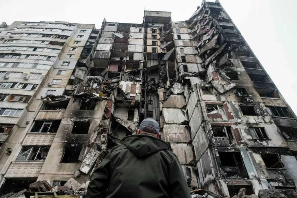 A badly damaged residential building in Kharkiv