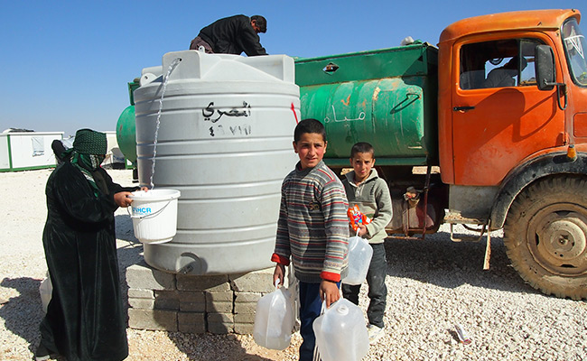 Water truck supplying clean water in Zaatari camp