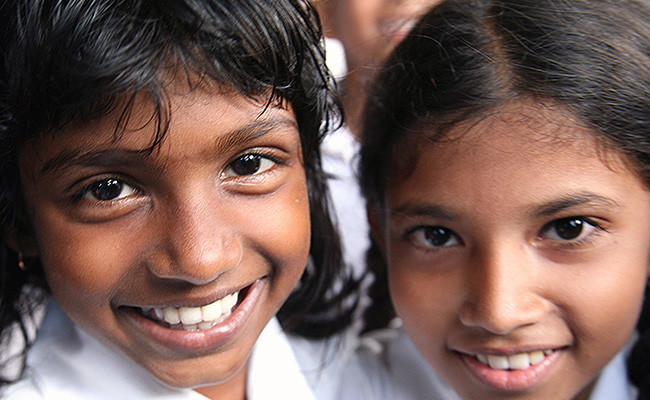 Students at a new school DEC member World Vision rebuilt after theirs was damaged by the 2004 Tsunami