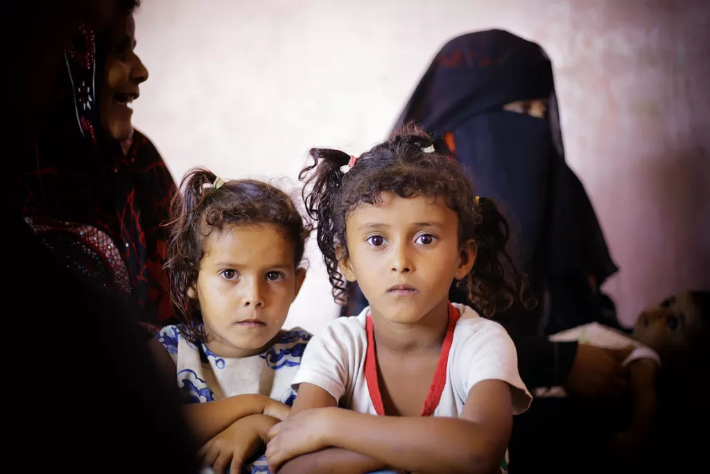 Aarya, 7, right, was found to be malnourished at a mobile clinic. Her family now receives food from a DEC-funded project in Lahj.