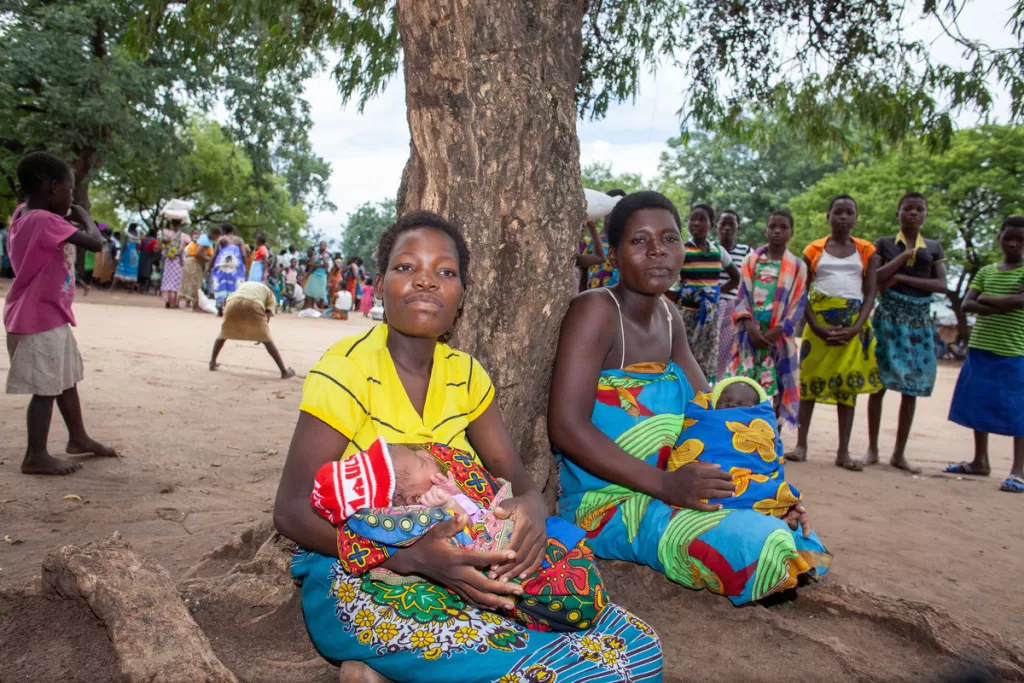 Ginesi (left) and Lucia (right) both gave birth in a camp for displaced people.