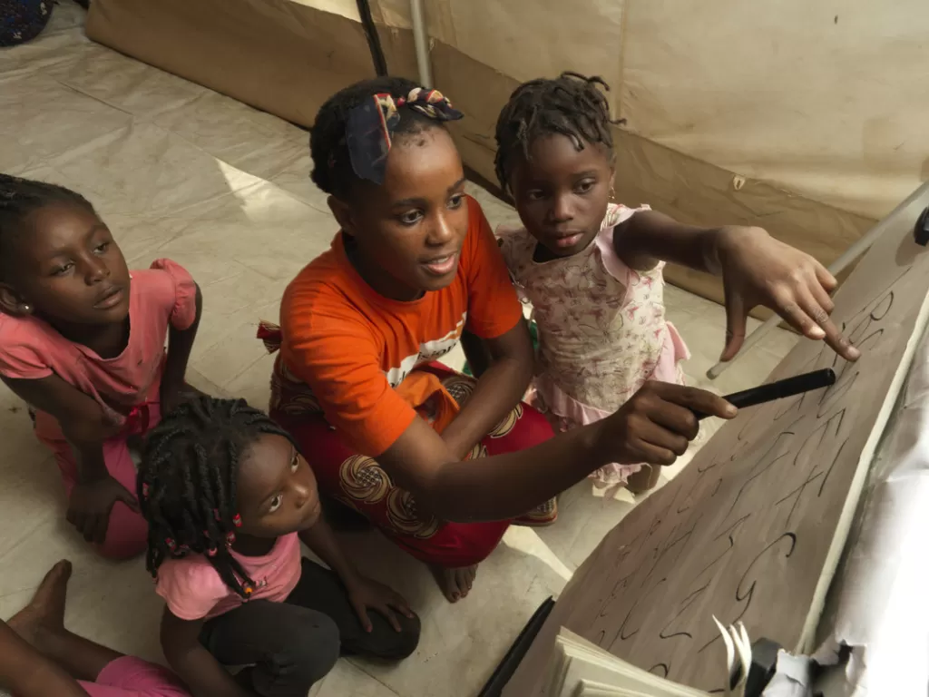 Children attend a Child-Friendly Space run by World Vision in Buzi, Mozambique following Cyclone Idai. 