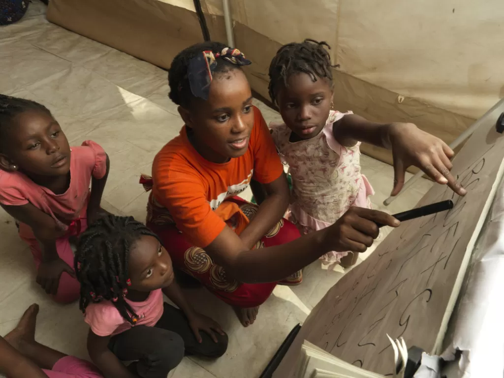 Children attend a Child-Friendly Space run by World Vision in Buzi, Mozambique following Cyclone Idai.