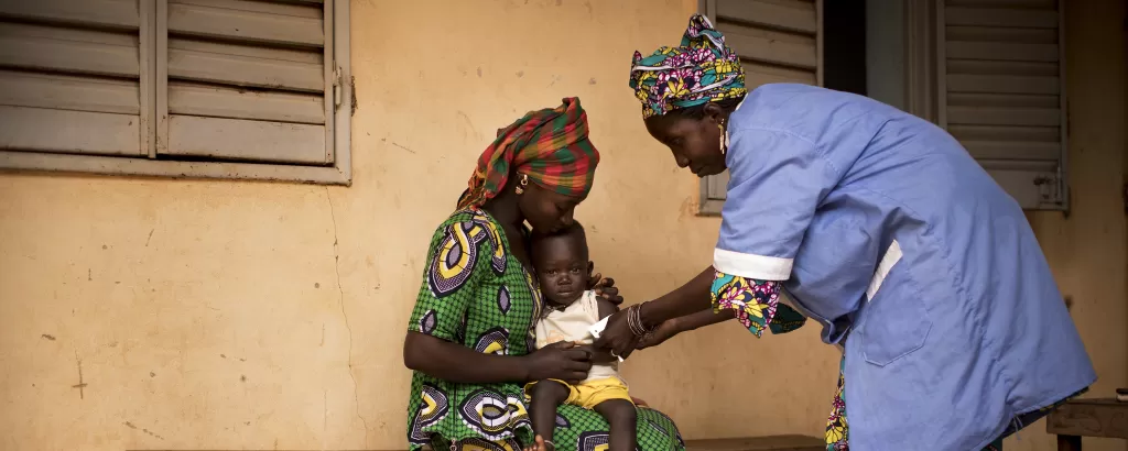 A baby is checked for malnutrition in Mali