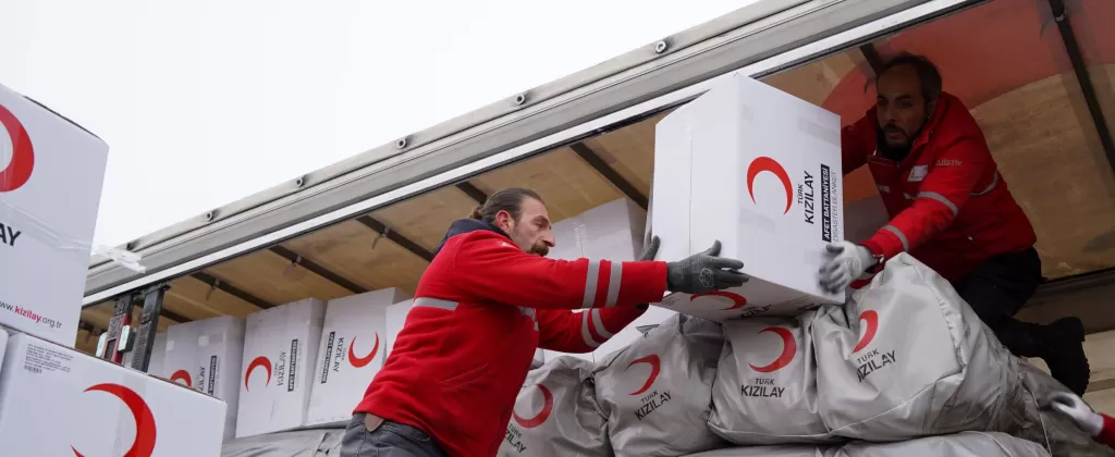 Teams from the Turkish Red Crescent deployed in ten affected provinces with stocks of food and basic aid items
