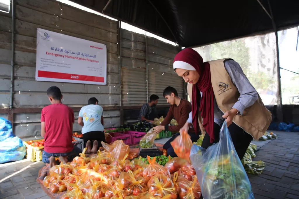 Action Aid's local partner delivering fresh vegetables in May 2025 