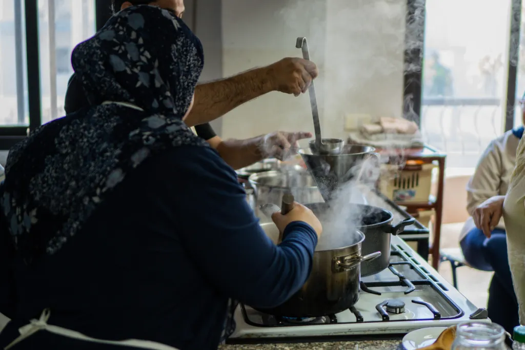 Women cooks in kitchen in Beruit 