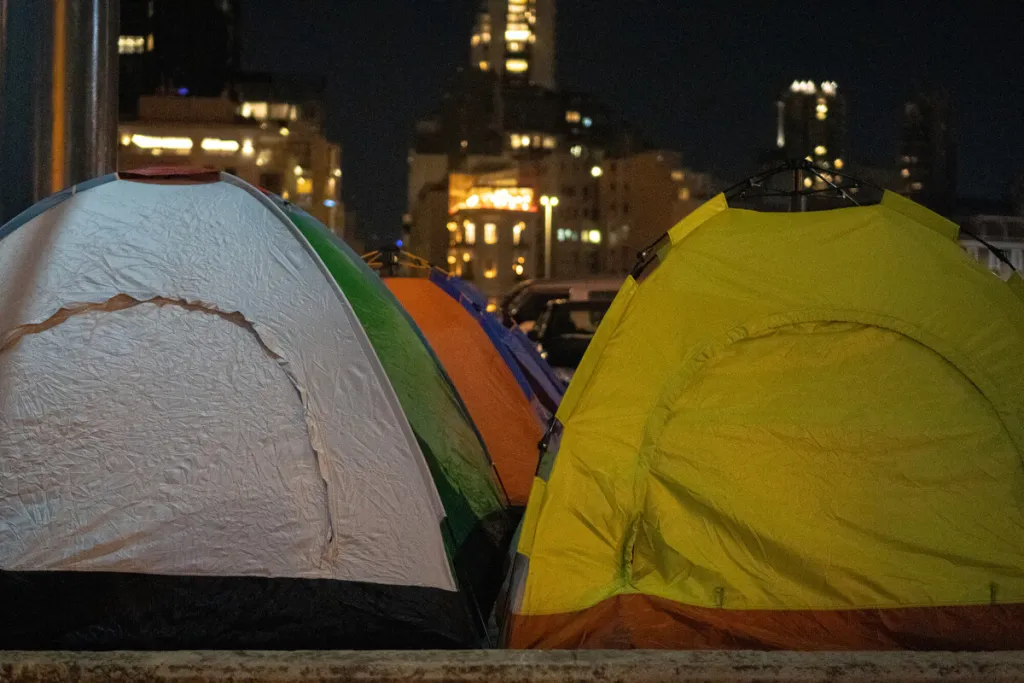 Tents in a city setting 