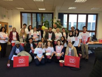 A group of volunteers ready to raise money at a rugby match