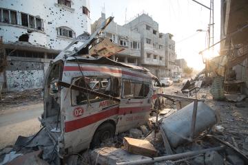 A destroyed ambulance amid rubble in Gaza