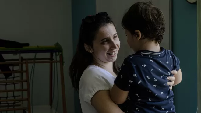 Bodhana* plays with her son, Kuzma*, at the Centre for Development and Socialisation in Lviv, Ukraine