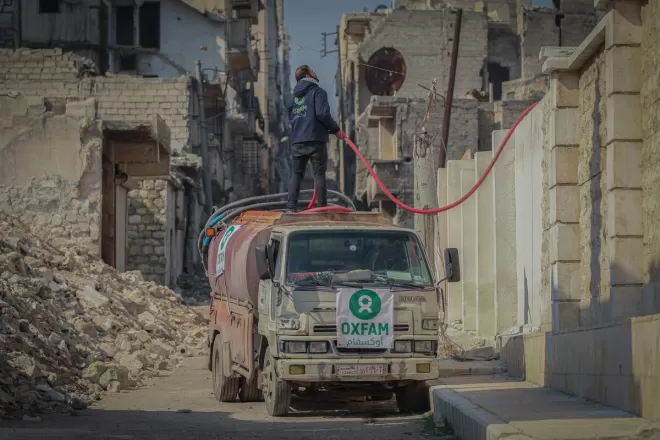 An Oxfam truck delivers water to people affected by the earthquakes in Syria 