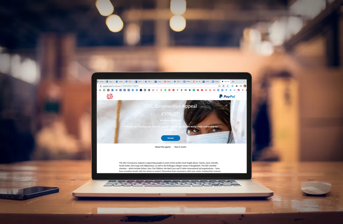 A laptop with the Paypal donation platform on screen